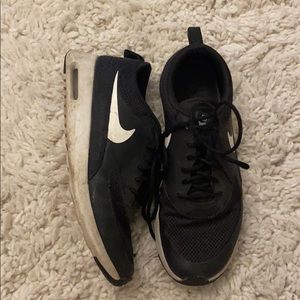 black nike running shoes